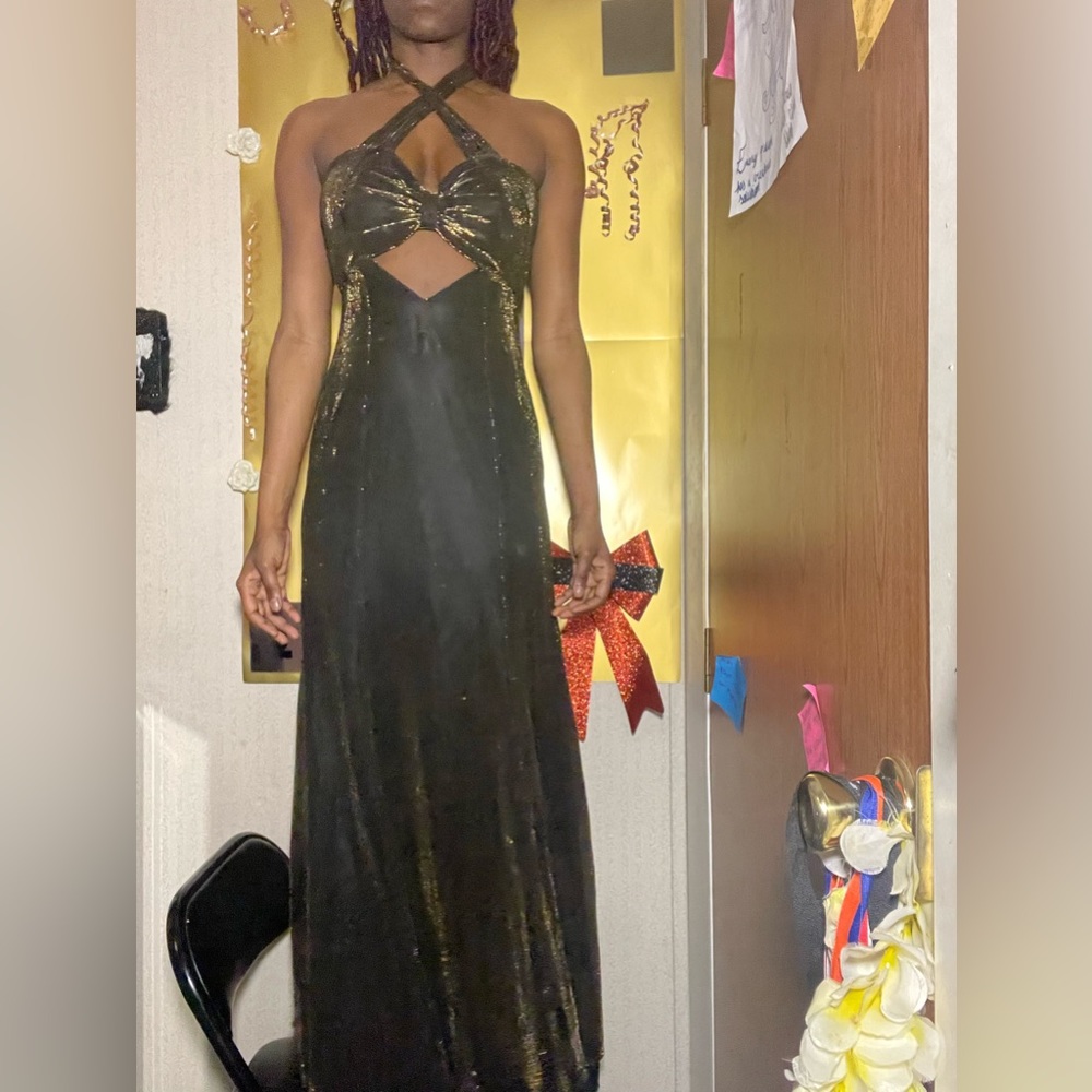 Long black and gold gown. Perfect for almost any occasion.